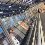 Art in Transit: Houda Bakkali Transforms Madrid Airport into an Immersive Digital Art Space